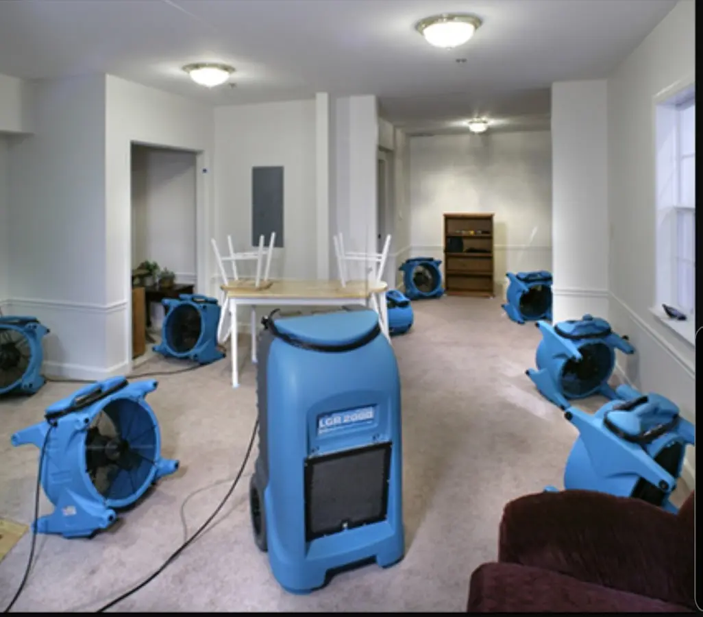 Air movers and dehumidifier setup for Water Damage Restoration in Somersworth